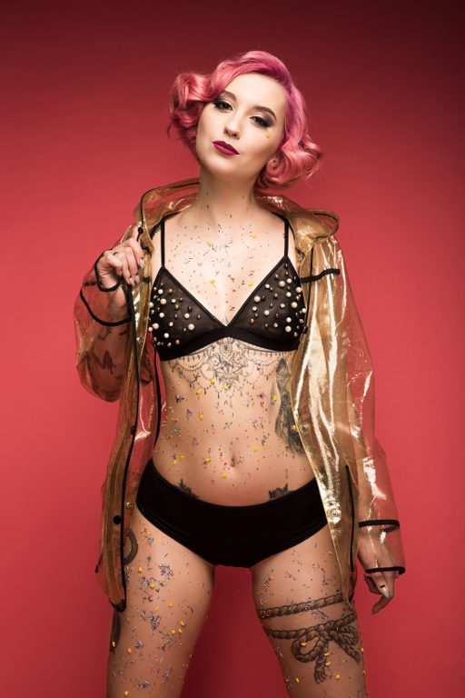pretty-pink-haired-curly-girl-with-tattoos-in-ling-2023-02-23-03-58-30-utc_512x768